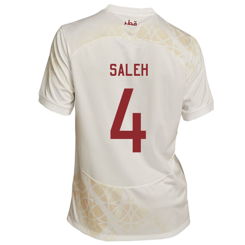 Kinder Katarische Hagar Saleh #4 Goldbeige Auswärtstrikot Trikot 22-24 T-shirt Österreich